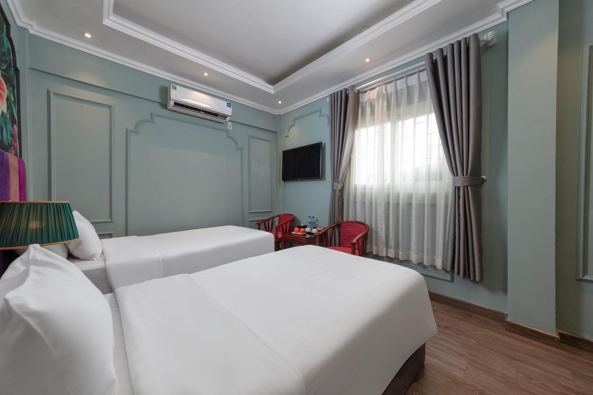 Madelise Amica Hotel And Travel Hanoï Chambre photo